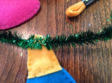 back side of bulb stitched to tinsel