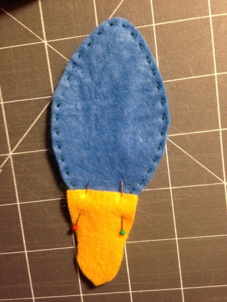 socket pieces pinned to a blue felt bulb