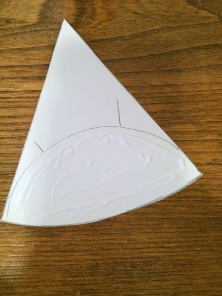 Baby Faces Birthday Banner - apply glue to hat