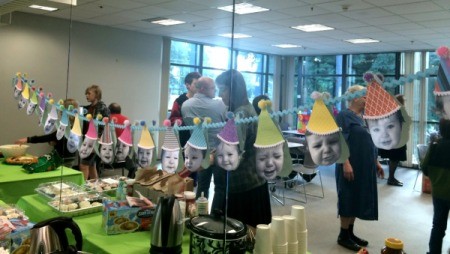 Baby Faces Birthday Banner - hanging banner