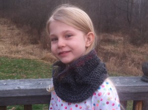young girl wearing cowl