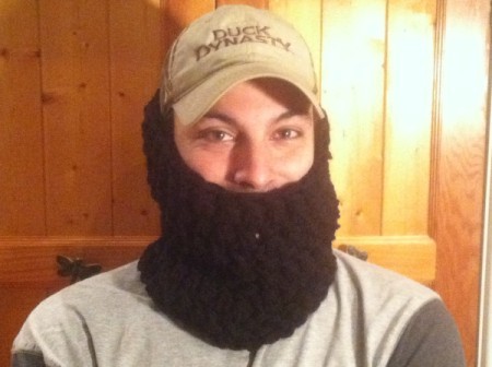 pulled up over ears to nose