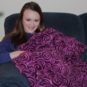First Sewing Project: Fleece Blanket - girl on couch with blanket