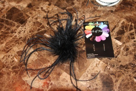 closeup of feather clip used