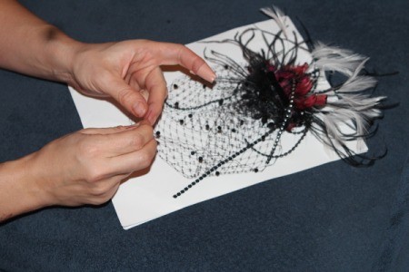 sewing beads on veil