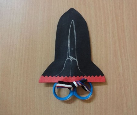 rocket sketched on outside of case