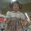 doll in floral dress with white top