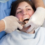 Woman Having Tooth Pulled