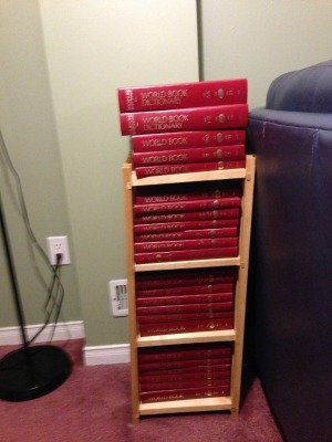 red volumes on shelves