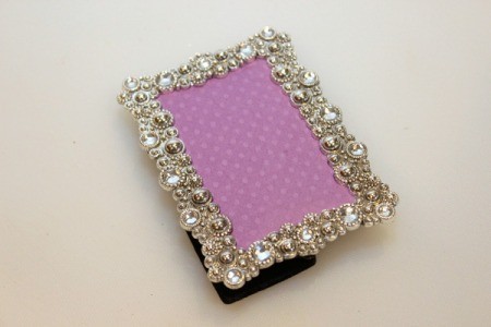 cardboard and paper in frame