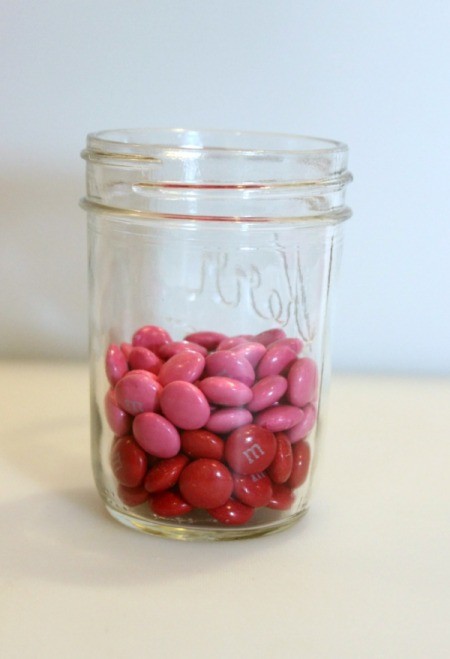 dark pink candy in jar