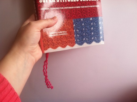 view of tail with bookmark in book