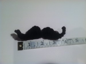 mustache with measuring tape
