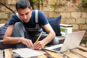 Man Planning a Backyard Patio