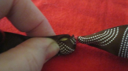 close ribbon over bead