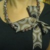 closeup of woman wearing necklace