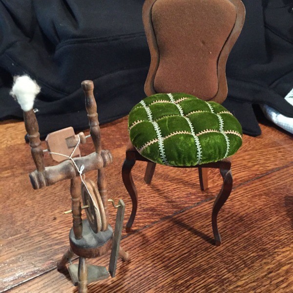 chair and spinning wheel