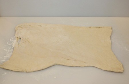 roll out pizza dough