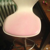 pink stain on white leather seat
