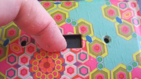 pressing paper into switch hole