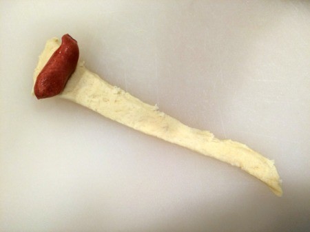 put sausage on dough