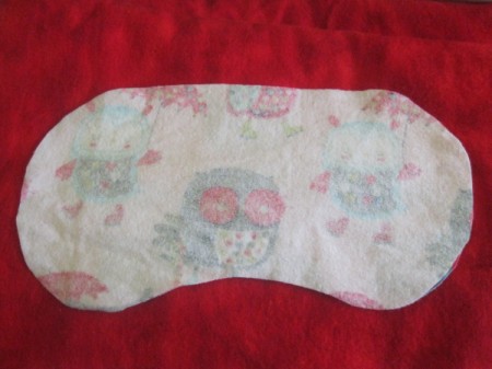 place other piece of fabric with right sides together and elastic ends inside seam allowance