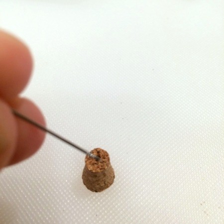 poke hole in cork