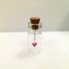 finished heart in bottle