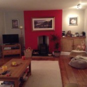 red accent wall living room