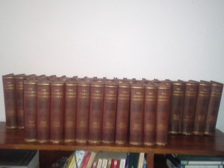 volumes on a shelf
