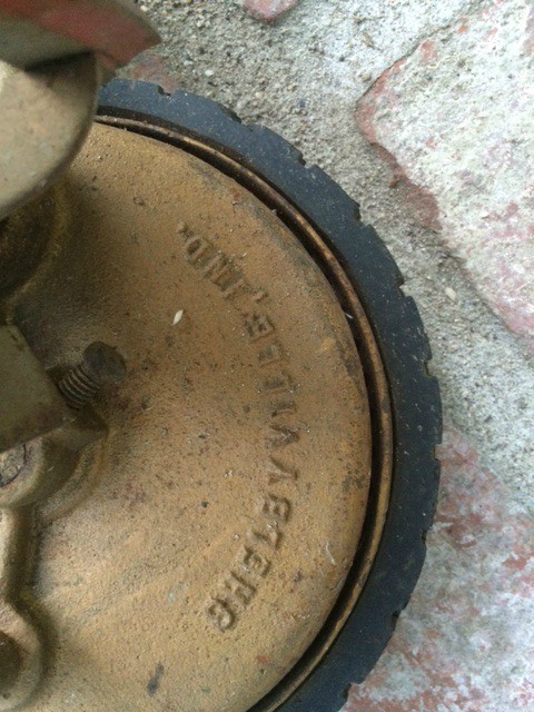 closeup of inside of wheel with Shelbyville Ind. cast onto metal