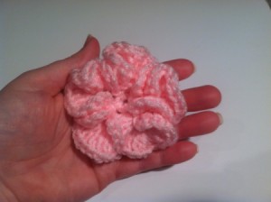Finished pink crochted flower.