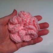 Finished pink crochted flower.