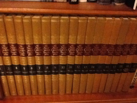 brown volumes on shelf