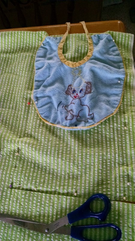 measuring for larger bib using a small baby bib