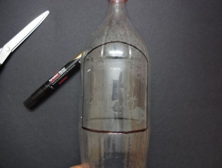 A hanging bottle planter