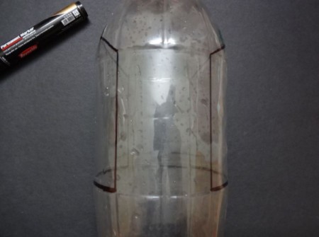 A hanging bottle planter