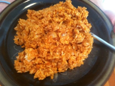 A scoop of cooked South of the Border Rice.