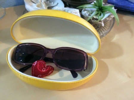 heart in eyeglass case