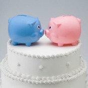 Piggy banks on top of wedding cake
