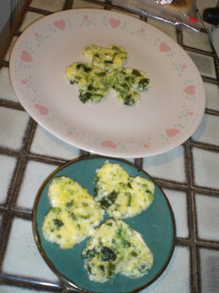 A plate of clover shaped eggs.