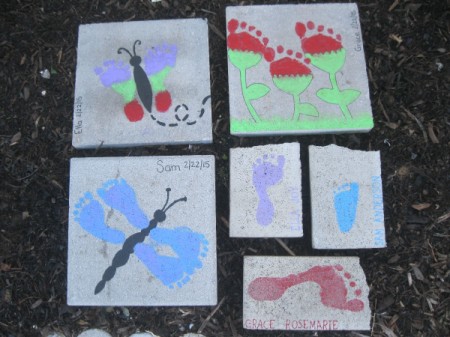 A collection of footprint painted stepping stones.