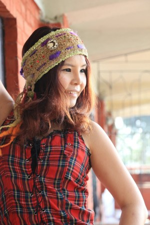 young woman wearing a headband