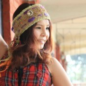 young woman wearing a headband