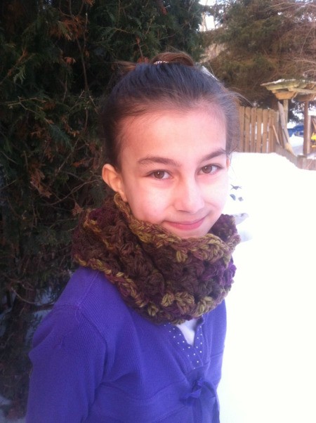 young girl wearing the cowl