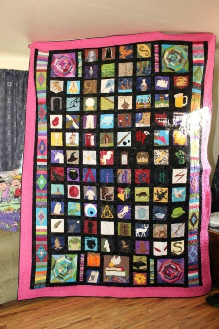 full quilt being held up