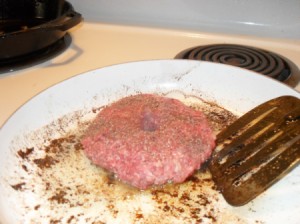 cooking a patty with a small hole in the center