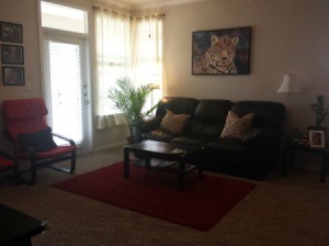 corner of room with windows and couch