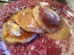 Creamy Vanilla Pancake Syrup - homemade syrup on a plate of pancakes