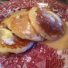 Creamy Vanilla Pancake Syrup - homemade syrup on a plate of pancakes